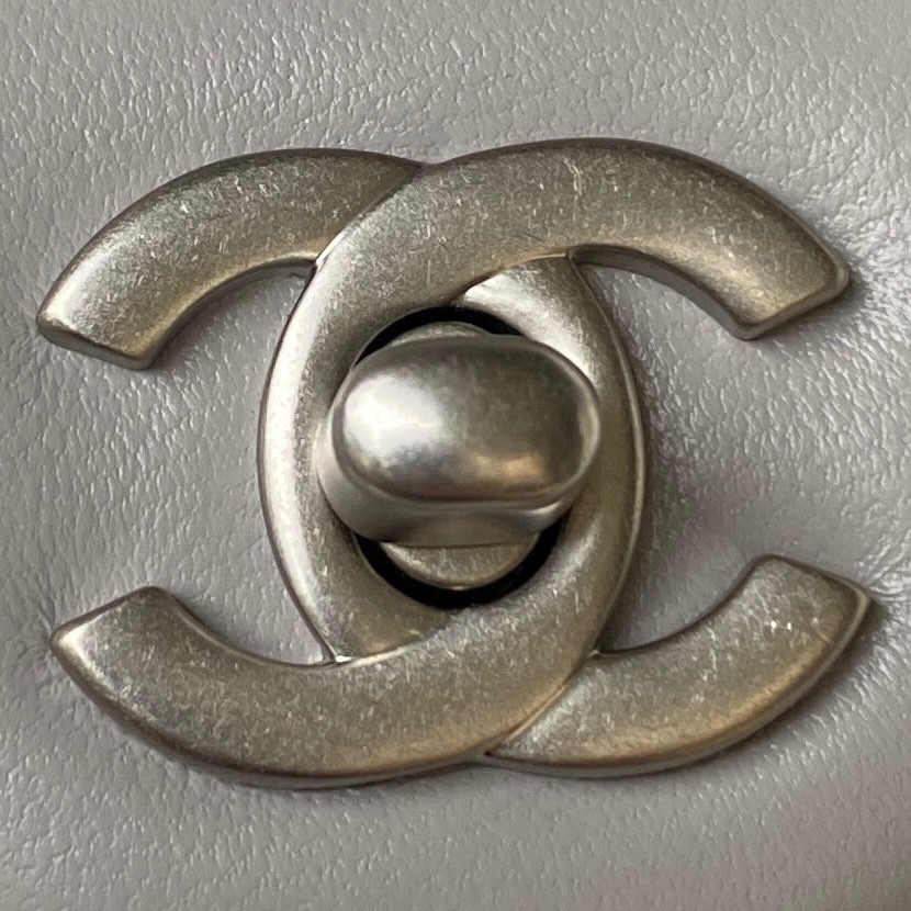 Ch*el mini flap bag shiny calfskin & silver-tone metal light gray 4.7 × 7.8 × 2.3 in