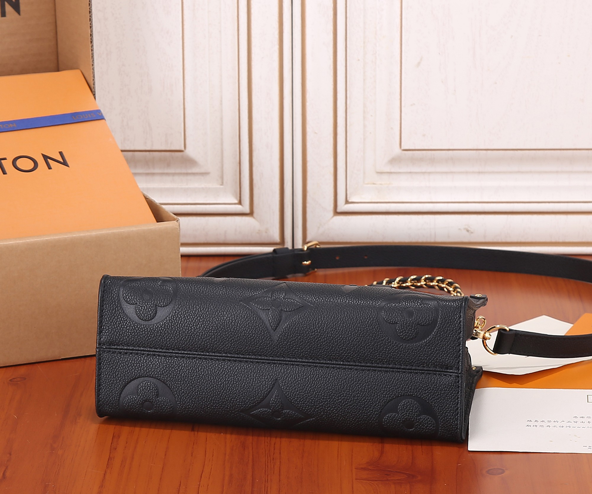 LV OnTheGo East West M23640 9.8 x 5.1 x 3.9 inches