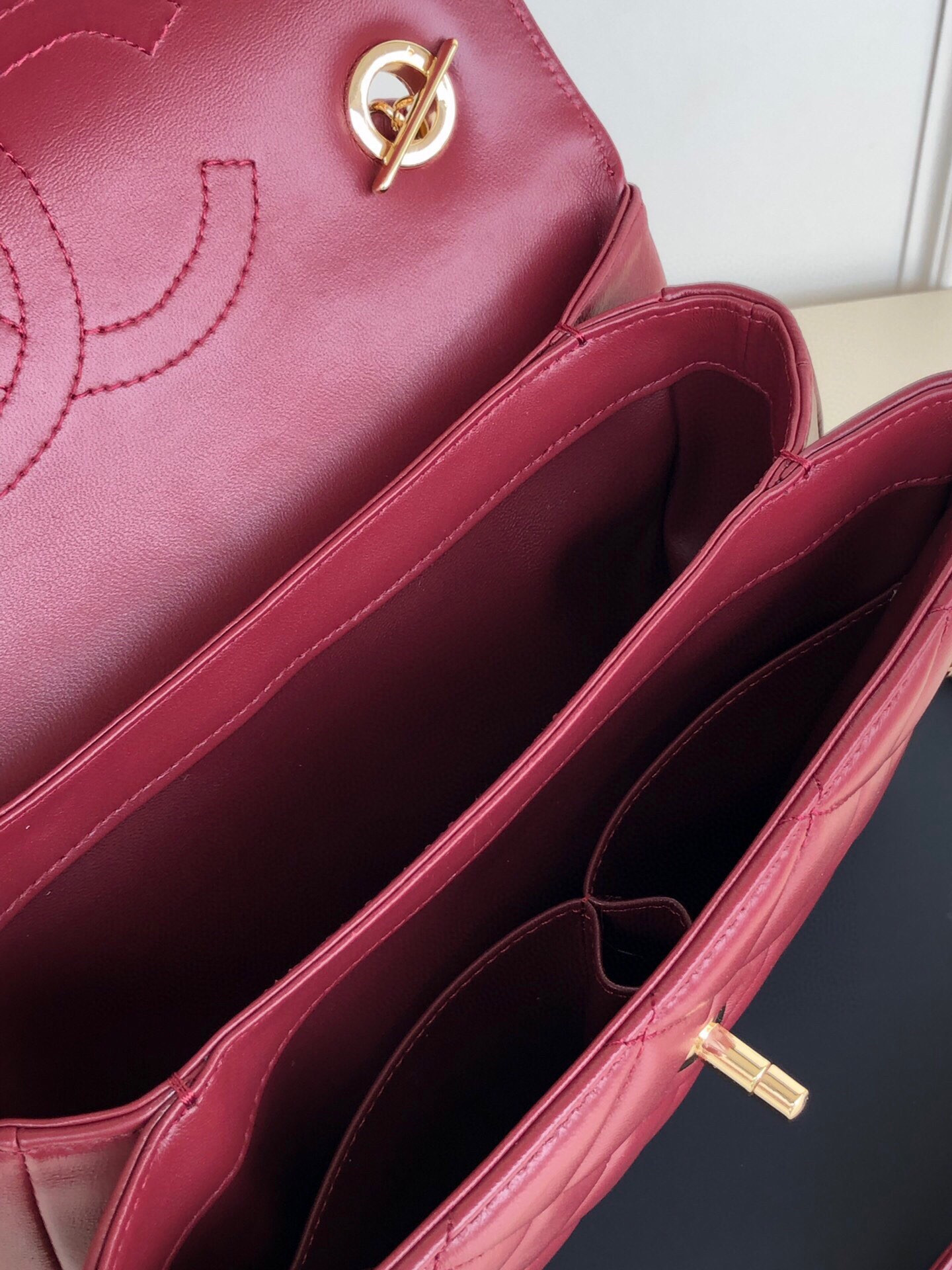 Ch*el flap bag with top handle 6.6 × 9.8 × 4.7 in