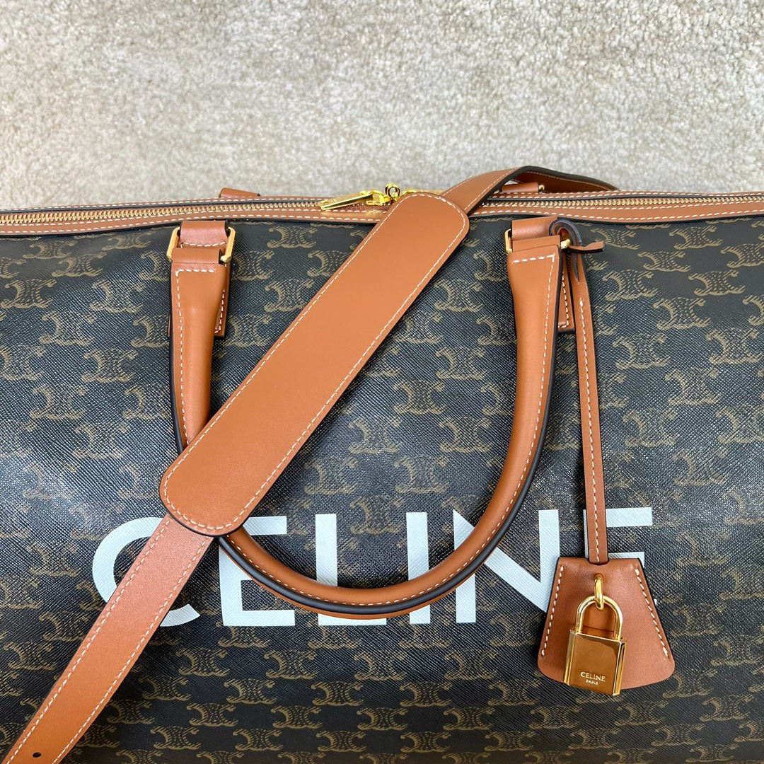 Ce**e large travel bag in triomphe canvas with Ce**e print 50x27x23cm